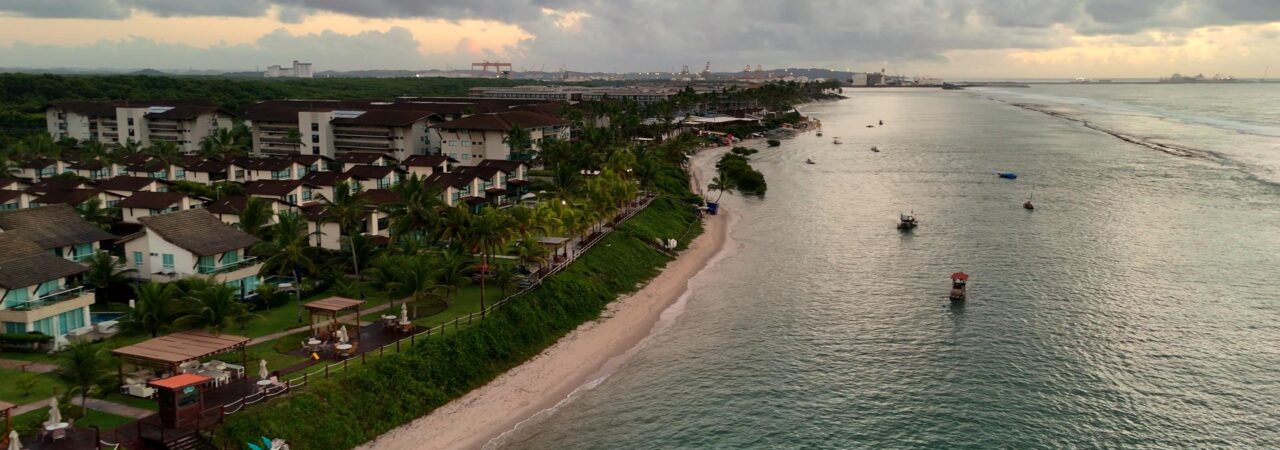 Flight with DJI Mini 4 Pro drone. View of a beach with boats on it.